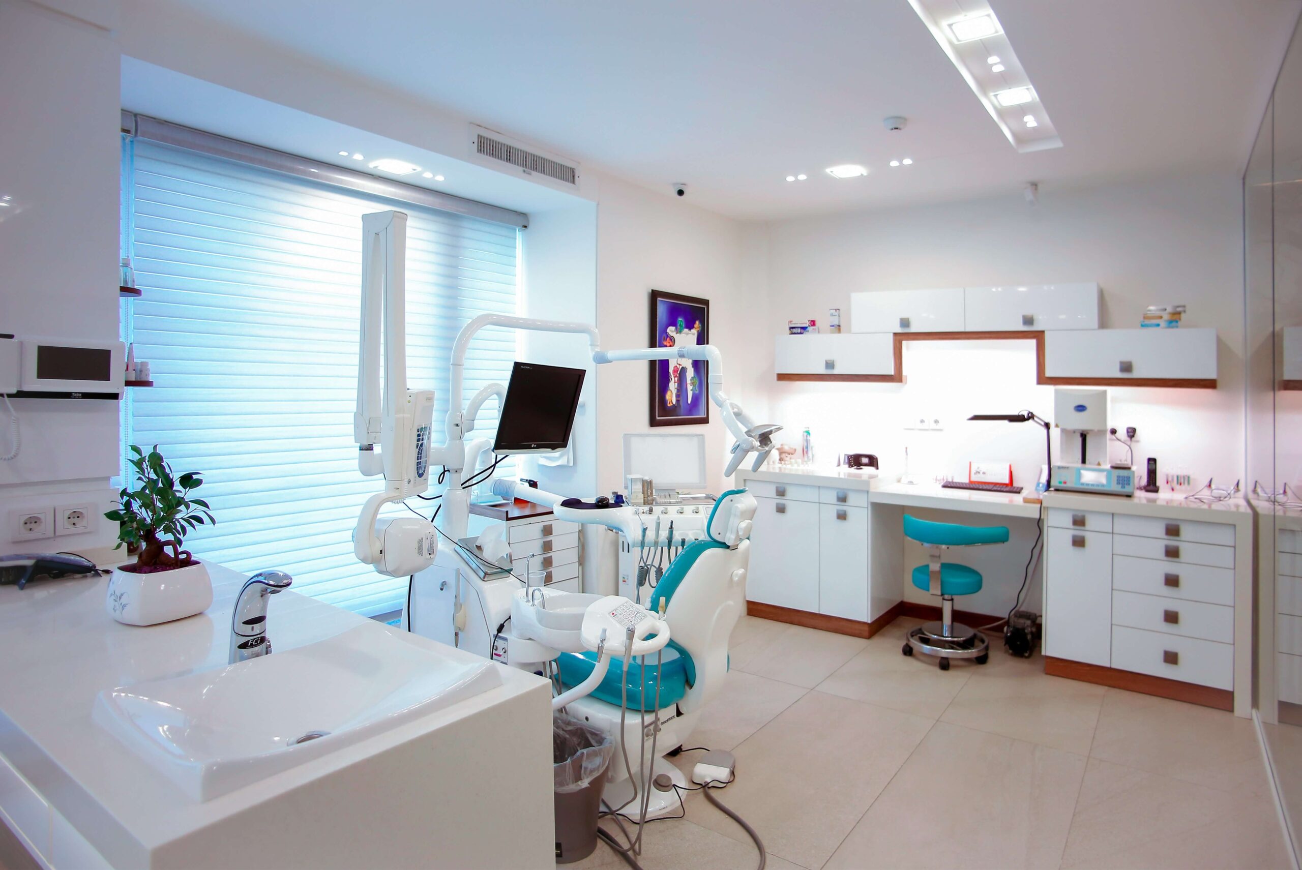 dental exam room with blue chair